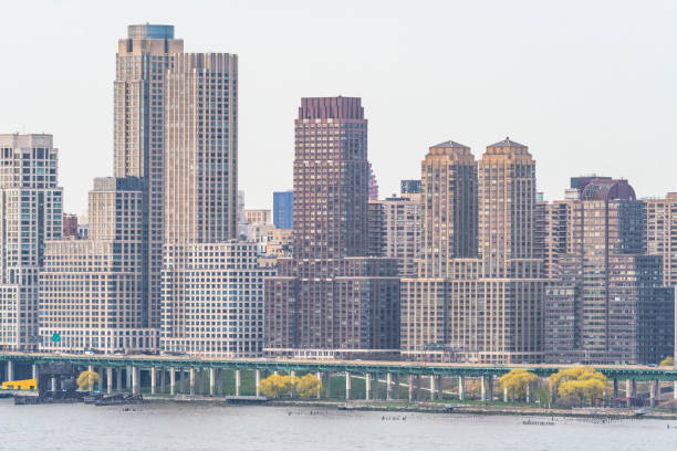 istock Manhattan skyscrapers during dusk sunlight, modern buildings 1484453312