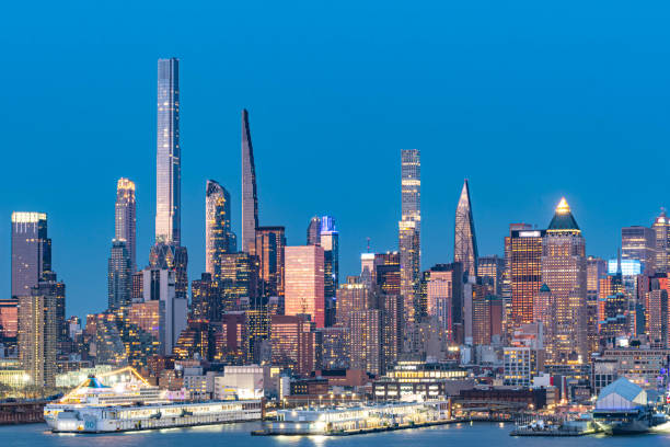 istock Manhattan skyscrapers during dusk sunlight, modern buildings 1484453369