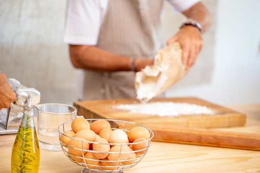 The cook preparing a pasta dough