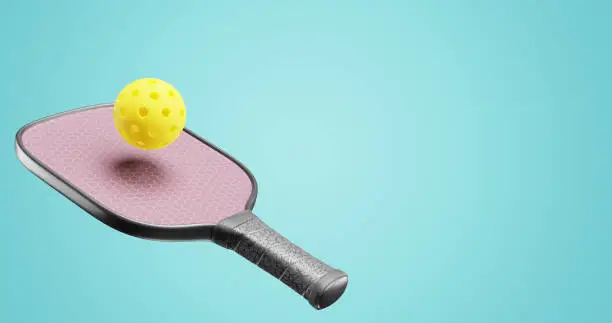 Pickleball paddle racket and sports ball. 3d rendering