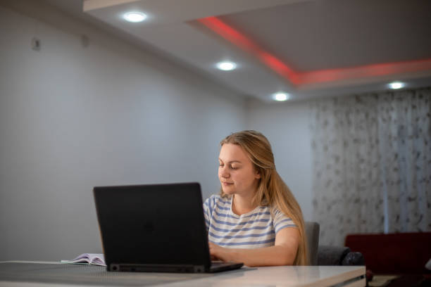 istock Young  woman working from home 1484467172