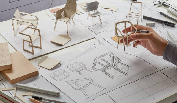 istock Designer sketching drawing design development product plan draft chair armchair Wingback Interior furniture prototype manufacturing production. designer studio concept . 1484470782