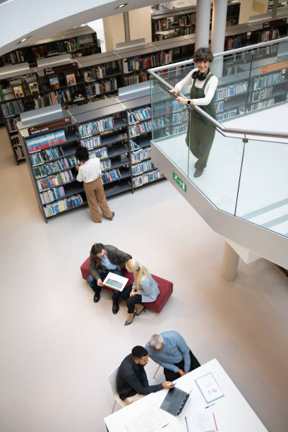 istock Adult students and brainstorming in the library 1484475106