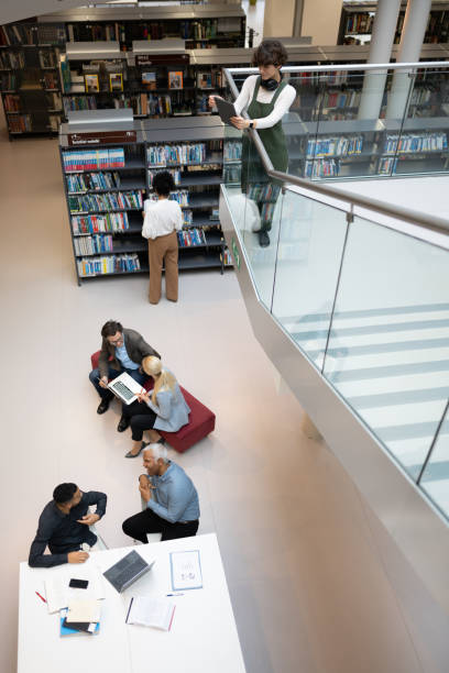istock Adult students and brainstorming in the library 1484475109