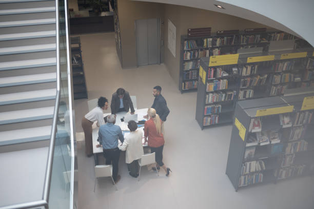 istock Adult students and brainstorming in the library 1484475240