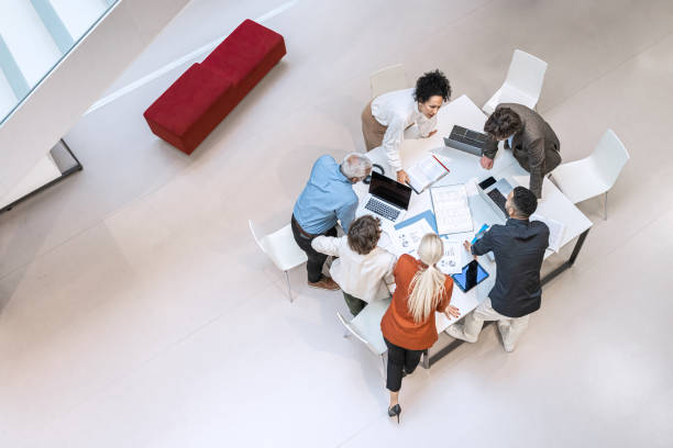 istock Adult students and brainstorming in the library 1484475297