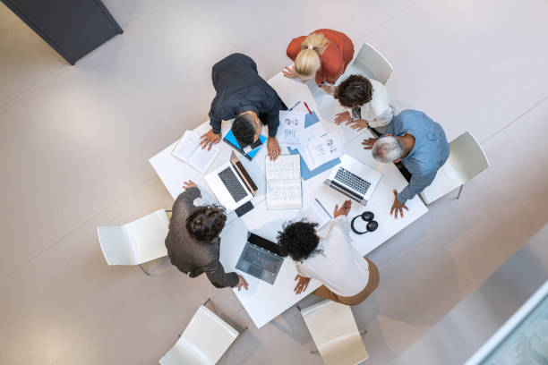 istock Adult students and brainstorming in the library 1484475303