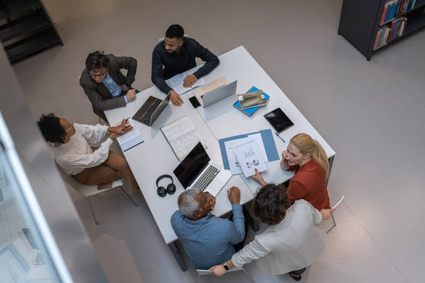 istock Adult students and brainstorming in the library 1484475340