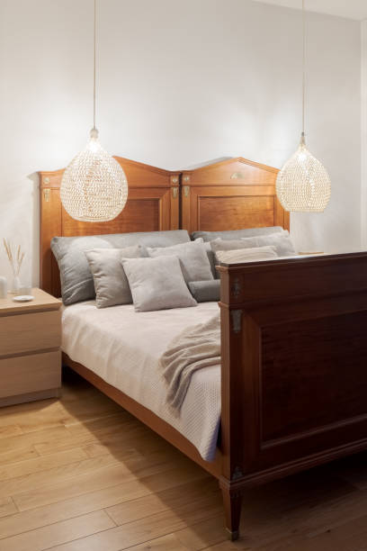 istock Double wooden bed in simple bedroom 1484475681