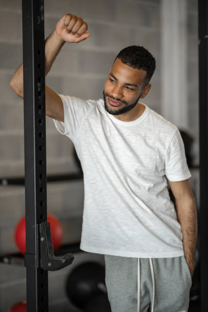 istock Man with kettle in fitness. 1484478579