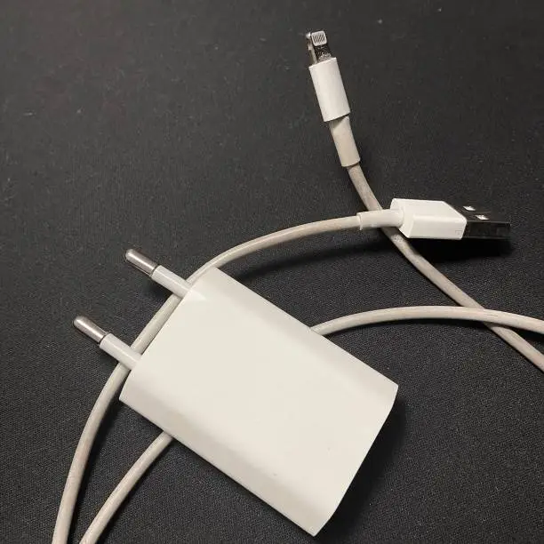 Photo of Apple USB connection cable for iPhone and iMac.