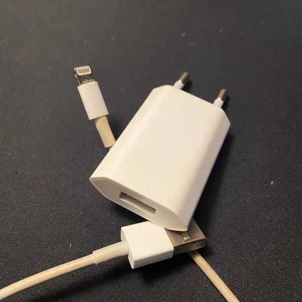 Photo of Apple USB connection cable for iPhone and iMac.