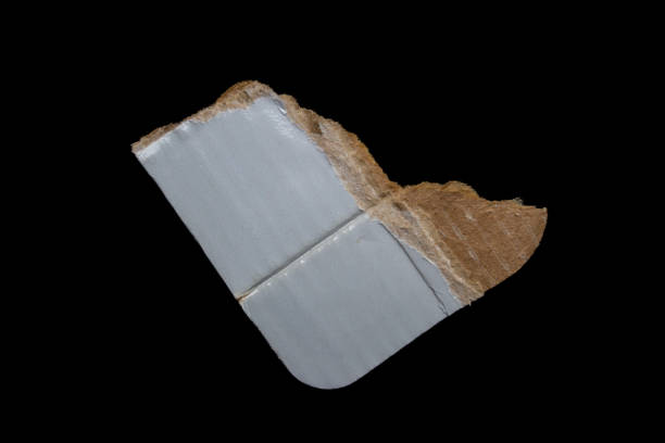 istock Ripped paper piece on black background 1484479353