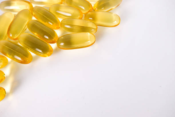 istock Close-up of vitamin E capsules or fish oil 1484480205