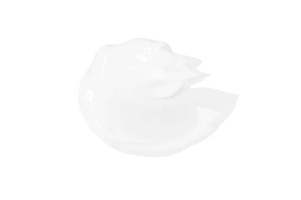istock A smear of white cosmetic cream without shadows on a white background. Isolated. 1484481492