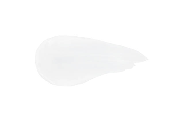 istock A smear of white cosmetic cream without shadows on a white background. Isolated. 1484481685
