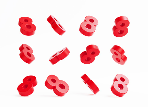 Red number eights on white background. Horizontal composition with copy space.