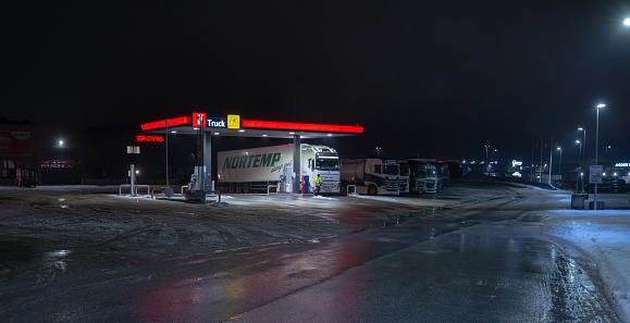 Lillesand, Norway - January 03 2023: YX Lillesand gas station at night.