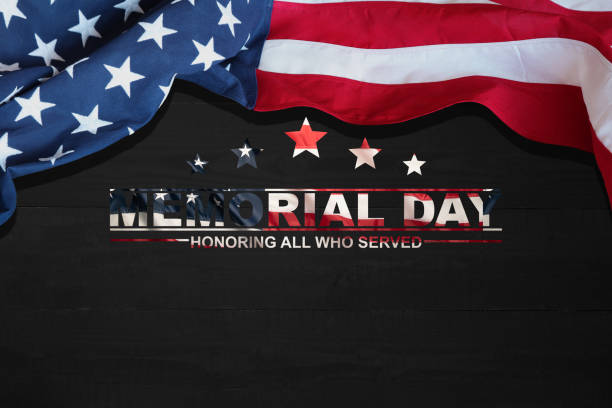 istock Text Memorial Day on American flag background. Honor and Remember. Military Veteran. 1484491325