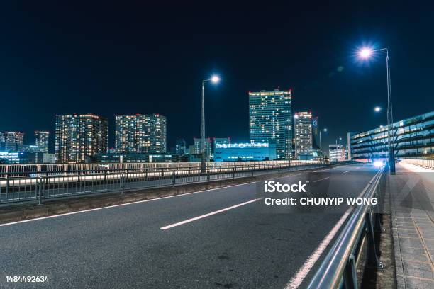 Urban Road In Harumi Wharf And Toyosu Wharf Tokyo Stock Photo - Download Image Now - Apartment, Architecture, Arrow Symbol