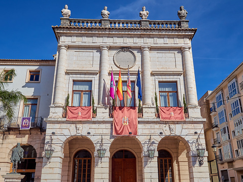 Gandia, Spain - April 6, 2023: Facade of the City Hall of Gandia. Gandía is the capital of the county of La Safor. Community of Valencia, Spain, Europe