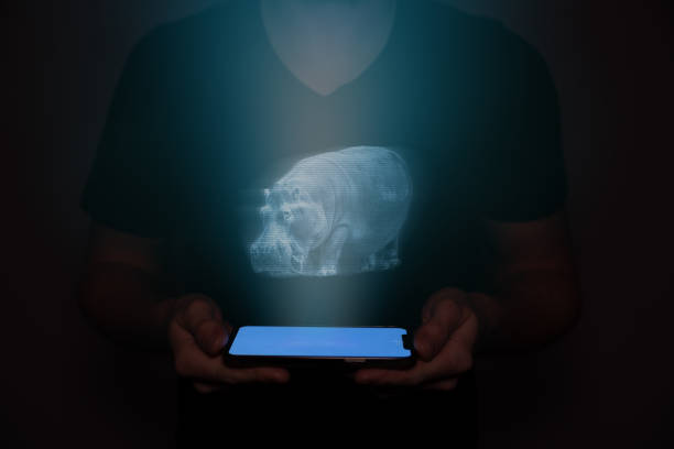 istock A man in the future holds a on which a hippo is projected. New technology. 1484505571