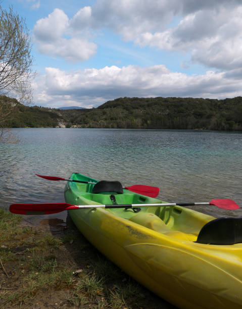istock A colourful canoe near the shore 1484514598