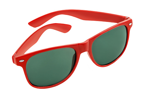 red sunglasses isolated on red background.