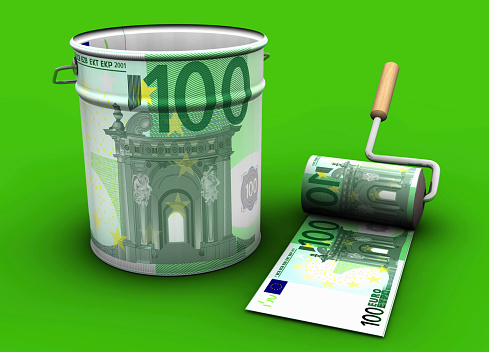 Image of a paint roller printing Dollar on banknote-size paper. Rising inflation and high cost of living have increased counterfeiting. / You can see the animation movie of this image from my iStock video portfolio. Video number: 1484447804