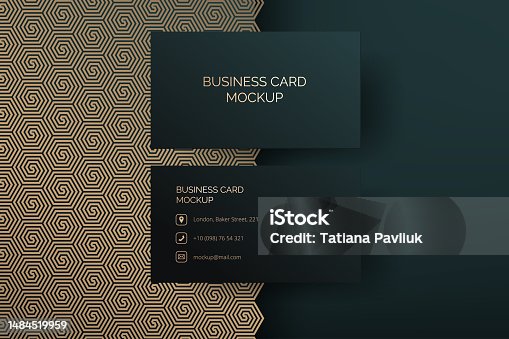 istock Modern and elegant vector business card mock up template. The hexagon pattern in green and gold colors creates an abstract and luxurious design. Perfect for corporate branding and presentations 1484519959