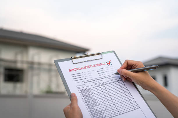 istock Inspecting building house on the report form. 1484525499