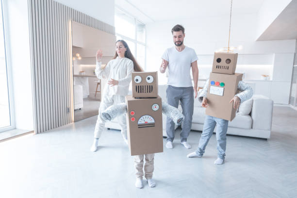 istock Family playing robots at home 1484530644