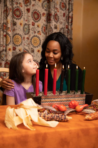 istock Kwanzaa Mom and Daughter Bond 1484543678