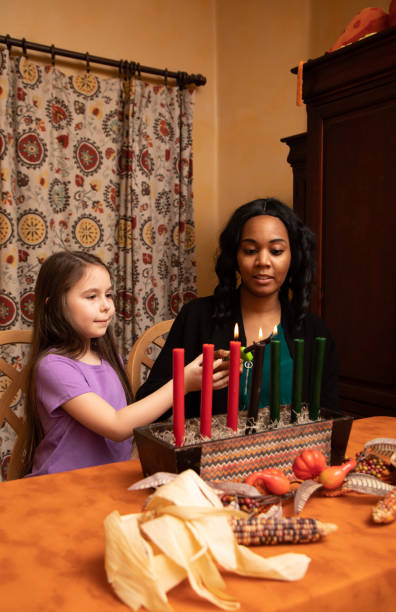 istock Kwanzaa Mom and Daughter Vertical 1484543877