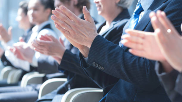 istock Business people applauding at meeting 1484543916