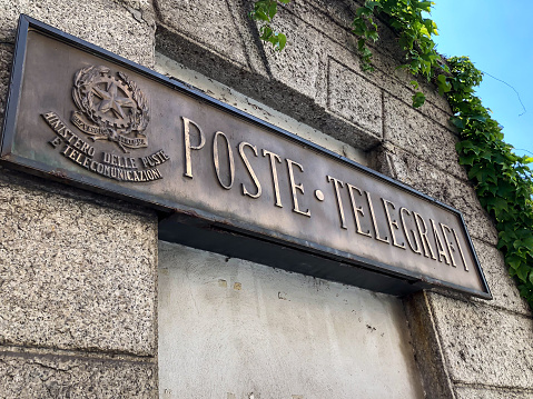 Poste Telegrafi sign, Italian postal service. Vintage Poste Italiane sign. Milan, Italy