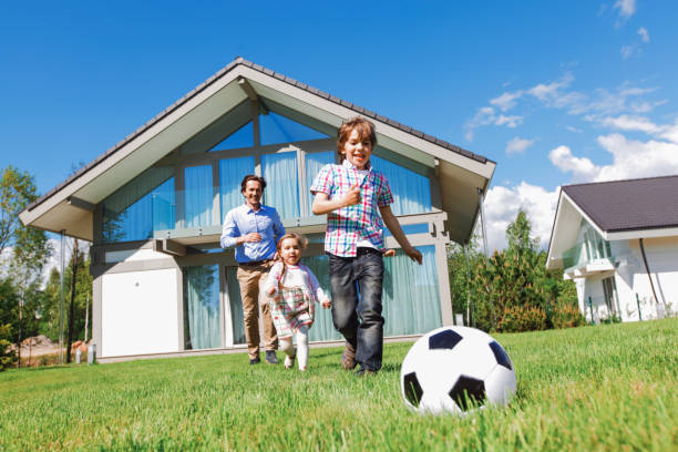 istock family playing football 1484545061