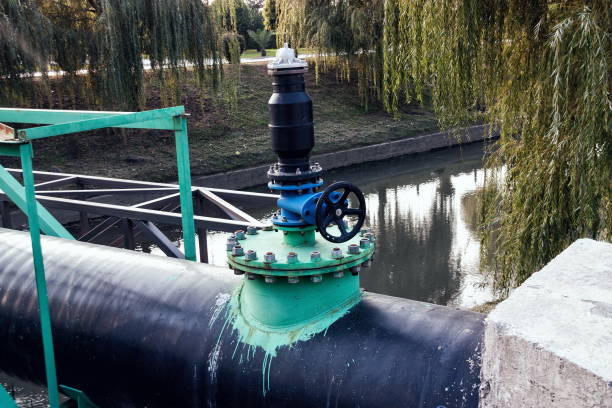 istock Industrial water tap on the creek damb 1484551790