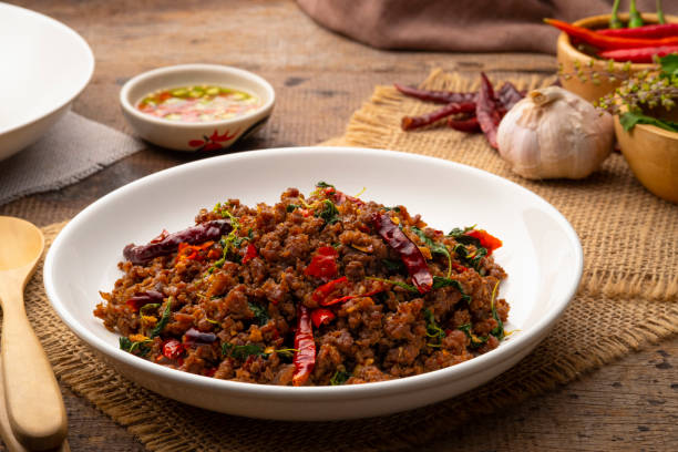 istock Thai Basil Minced beef,Stir fired ground beef with garlic and basil leaf in chilli sauce 1484557366