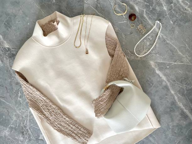 istock fashion. textured high collar top with long sleeves diffrent colors 1484562382