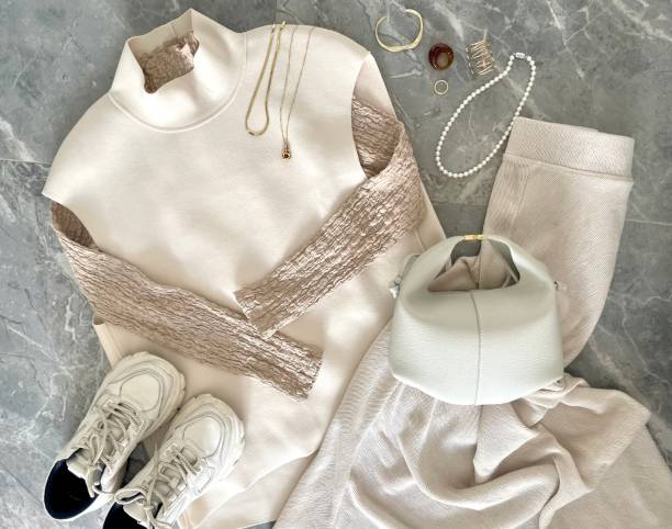 white fashion. textured high collar top with long sleeves