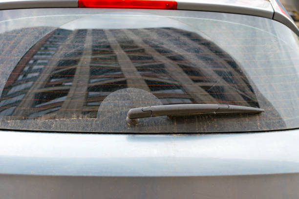 istock rear dirty car window with single wiper 1484562537
