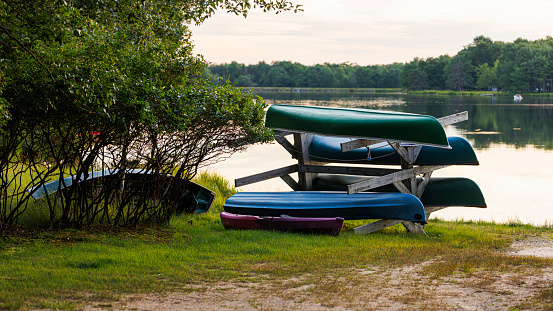 Kayak stand on the shore of the lake in Pennsylvania, Poconos, USA.