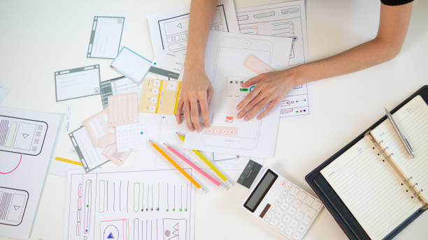 istock Mobile application developers are designing a ux ui system to make the display on the phone screen go smoothly because the ux ui system in a mobile phone affects the operation of various applications. 1484563922