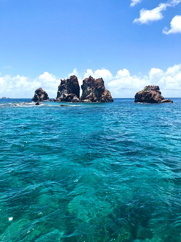 Rock formation in tropical turquoise waters
