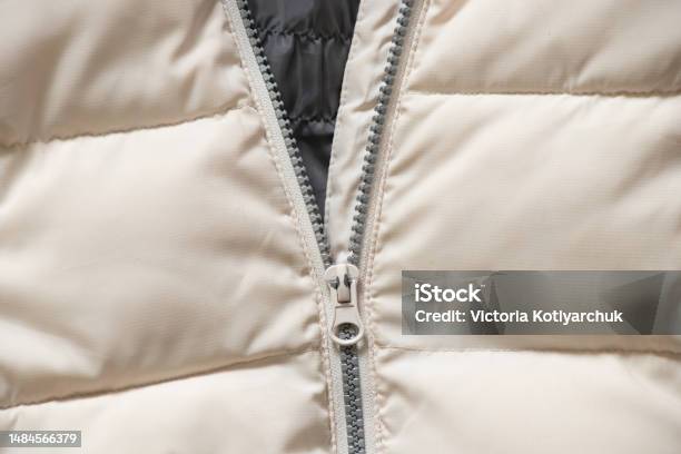 White Winter Womens Padded Jacket With Zipper As Background Close Up Stock Photo - Download Image Now