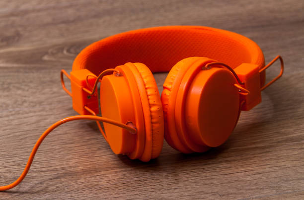 Headphones in multicolor abstract lighting.