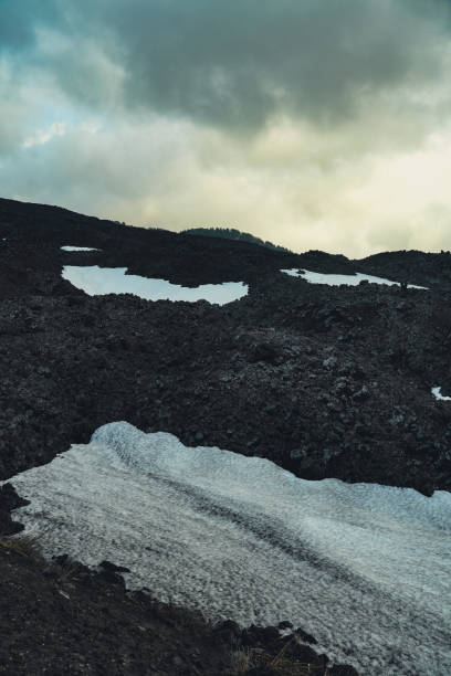 istock Snow melts on Etna volcano in spring. 1484567362