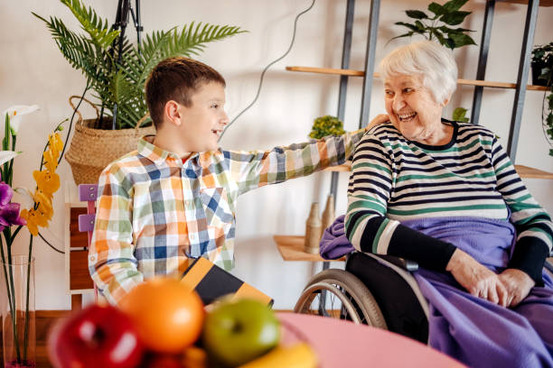 istock Old people with disability having support from grandson 1484569398