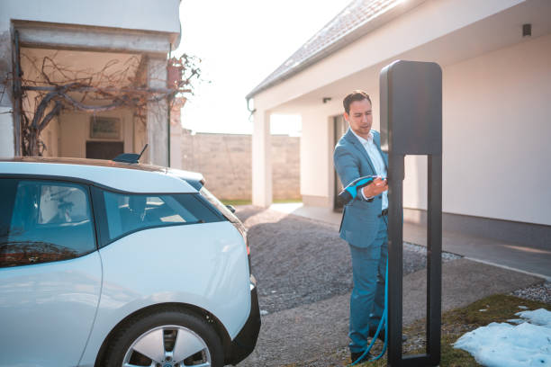 istock Electric Car and its Charging Station 1484573513